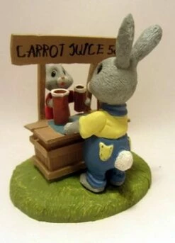 Tender Touches Rabbits At Juice Stand