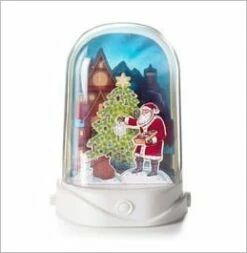 Light-a-Magic Santa Trims The Tree