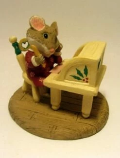 Tender Touches Mouse At Desk