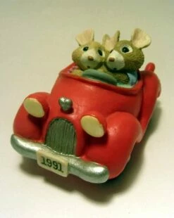 Tender Touches Mice In Red Car