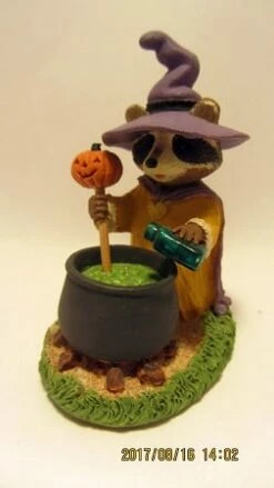Tender Touches Raccoon Witch With Caldron